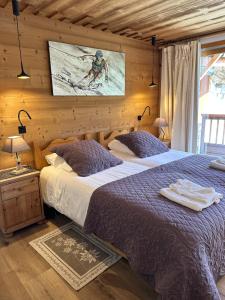 Postel nebo postele na pokoji v ubytování Chalet Barmaz