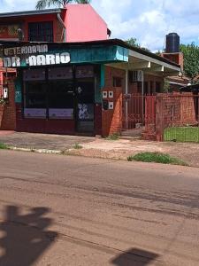 a building on the side of a street at departamento céntrico in Puerto Iguazú