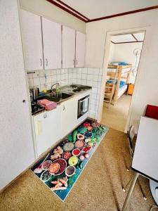 Kuchyň nebo kuchyňský kout v ubytování 25 Zimmer Ferienwohnung mit Zentrum von Mürren