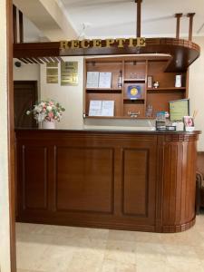 a reception area of a hospital with a reception desk at Hotel Ana in Constanţa