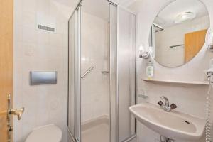 Koupelna v ubytování Hotel Garni Traube