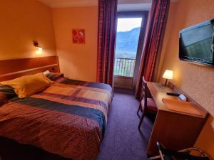 Postel nebo postele na pokoji v ubytování Hotel Bellevue