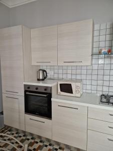 Η κουζίνα ή μικρή κουζίνα στο La dimora di Bacchilide