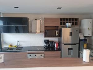 Η κουζίνα ή μικρή κουζίνα στο Departamento 2 amb frente a Casino