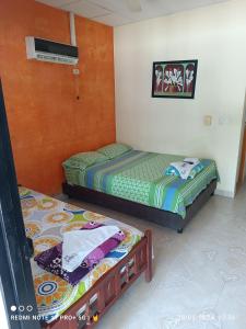 Ένα ή περισσότερα κρεβάτια σε δωμάτιο στο Hotel Villasol