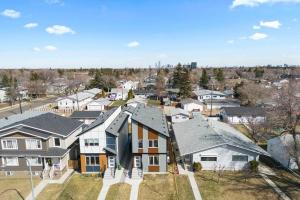 an aerial view of a residential neighborhood with houses at Stylish Suite-NearWEM-4 Bed-Central in Edmonton