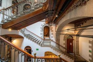 an overhead view of a staircase in a building at Casa de la Luz Hotel Boutique in Mexico City