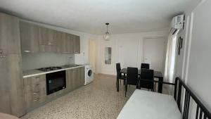 A kitchen or kitchenette at Santa Lucia Affittacamere