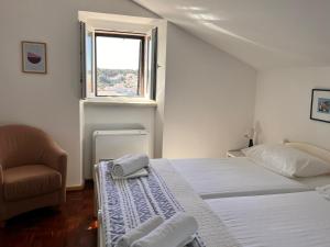 Postel nebo postele na pokoji v ubytování Apartment Oscar