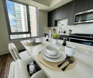 a kitchen with a table with two cups on it at The Perfect Scenario in Buckhead in Atlanta