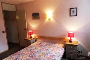 Ένα ή περισσότερα κρεβάτια σε δωμάτιο στο Résidence Corail - 2 Pièces pour 5 Personnes 74
