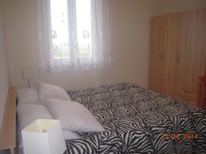 Postel nebo postele na pokoji v ubytování Bed and Breakfast Elisa