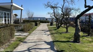 Κήπος έξω από το Vakantiechalet Oostkapelle VZ929 +6 φωτογραφίες