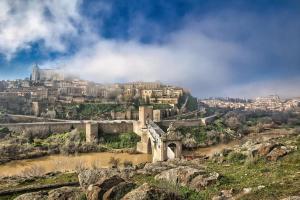 a view of the city of matera and a river at La Madriguera de Toledo in Bargas