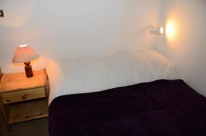 Postel nebo postele na pokoji v ubytování Résidence Sagittaire - Studio confortable avec balcon · Centre station MAE-7388