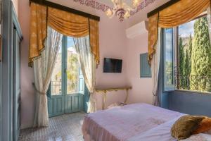 Postel nebo postele na pokoji v ubytování Villa Nicolaci - Liberty Suites