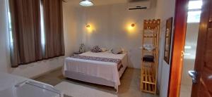 Postel nebo postele na pokoji v ubytování Casa Versel Trancoso