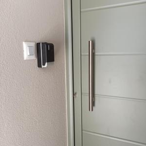 a door of a refrigerator with a door knob at Olgas cozy home in Chania