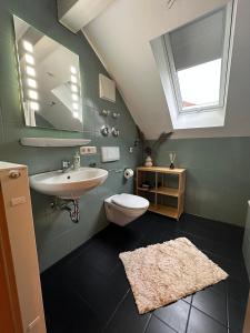 Koupelna v ubytování Sonnen Apartment + 8 fotografií