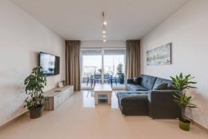 Zona d'estar a 9ten11 Seafront By Homely
