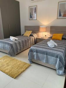 Voodi või voodid majutusasutuse Ta'lonza Luxury Near Goldenbay With Hot Tub App1 toas