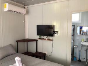 TV a/nebo společenská místnost v ubytování Apartamentos Equipados DMR #3