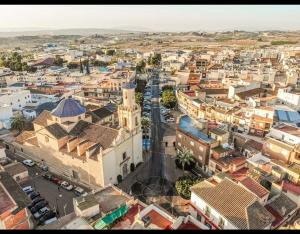 an aerial view of a city with buildings at Hotel Restaurante Costas - Fortuna in Fortuna