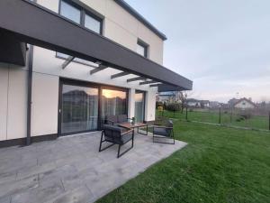 Zahrada ubytování Przestronny apartament, ogródek, bezpłatne miejsca postojowe w garażu, AWG APARTMENTS