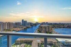 a view of a river from a balcony of a city at Infinite View Balcony - Amazing Pool - Gym in Hallandale Beach