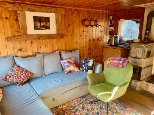 Posezení v ubytování Un nid au paradis - Chalet traditionnel avec beaucoup de cachet