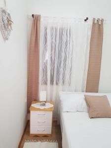Posteľ alebo postele v izbe v ubytovaní Holiday Home Nada