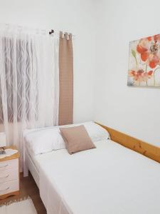 Posteľ alebo postele v izbe v ubytovaní Holiday Home Nada