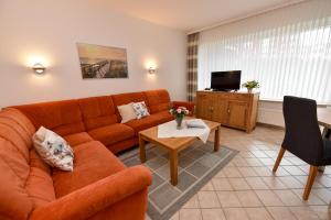 Ein Sitzbereich in der Unterkunft Haus "Luv und Lee" Appartement LEE02