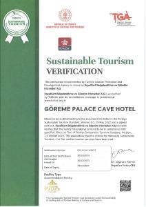 a green and white document with a certificate at Goreme Palace Cave Suites in Goreme