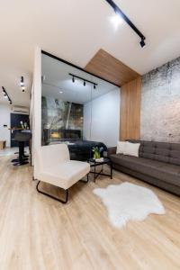 A seating area at ERKEL 18 APARTMAN Még 37 kép