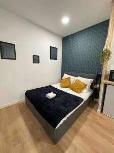 Кровать или кровати в номере Lorient, Studio Centre, Fibre Proche Gare, Plage