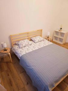 Ένα ή περισσότερα κρεβάτια σε δωμάτιο στο Justinrent 3