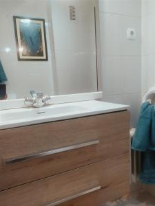 a bathroom with a sink and a mirror at TXIMELETA Haro in Haro +12 photos
