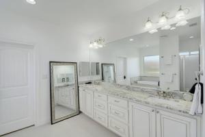a bathroom with a large sink and a mirror at Spacious House in Roundrock in Round Rock +111 photos