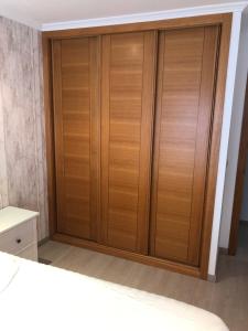Posteľ alebo postele v izbe v ubytovaní Piso Silgar Sanxenxo