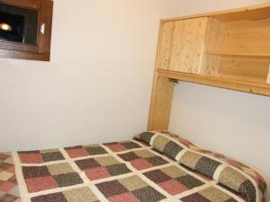 Residence Le Thymel - 2 Pièces pour 4 Personnes 54 tesisinde bir odada yatak veya yataklar