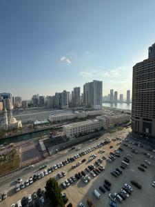an aerial view of a parking lot in a city at sharja 1103 in Sharjah