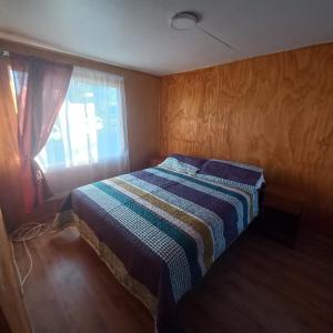 Postel nebo postele na pokoji v ubytování Casa Cardenal