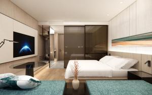 a bedroom with a bed and a living room at Mayfield Hotel Seoul in Seoul