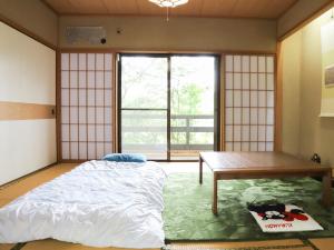 Kama o mga kama sa kuwarto sa ～みらい荘～　天然温泉付き一日一組様限定の６４坪広々民泊別荘