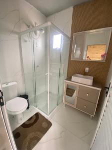 A bathroom at Pousada Aura Solar - 3 Quartos com Frente Mar