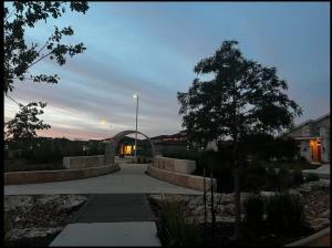a building with a street light and a tree at Banty Villa - Master Lounge in Austin