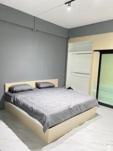 Krevet ili kreveti u jedinici u objektu Bamboo Apartment
