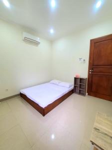 Легло или легла в стая в HOUSE IN SURAKARTA