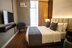 TV a/nebo společenská místnost v ubytování Amber Hotel - Cebu